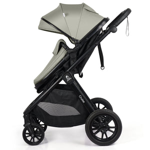 Sage-green stroller seat with black frame, canopy, and large front wheels