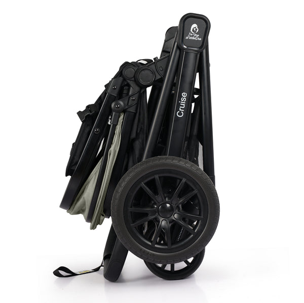 Black stroller with foldable frame and large wheels, showing “Cruise” branding