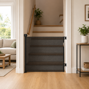 Black fabric retractable stair gate with side mounts for doorway use