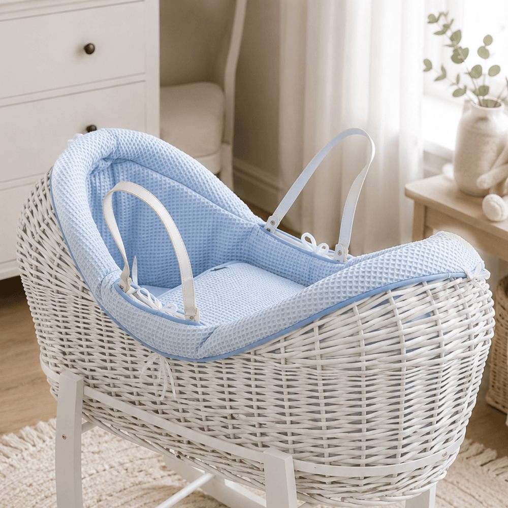 Light blue waffle knit moses basket liner with fitted sheet and ties