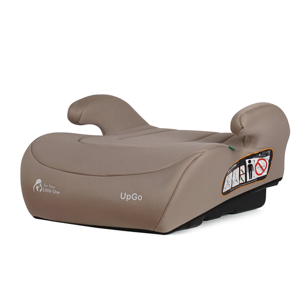 Latte beige booster seat with side arm supports and safety instruction label