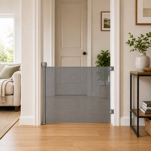 Grey fabric retractable baby stair gate with mesh panel and side posts