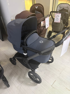 Bugaboo Fox 5 stroller, stormy blue seat with canopy and large front wheels