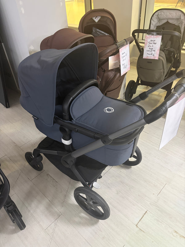 Bugaboo Fox 5 stroller, stormy blue seat with canopy and large front wheels
