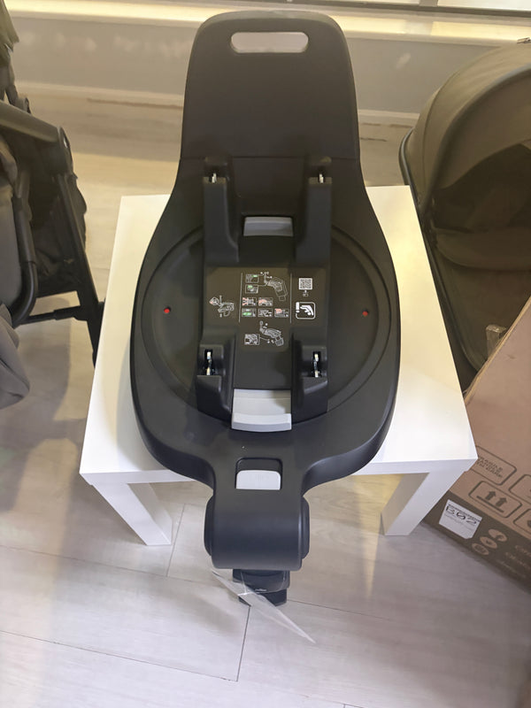 Venicci Tiago 360 ISOFIX car seat base with dark shell and visible ISOFIX connectors