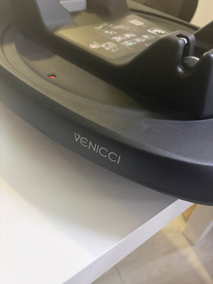 Venicci Tiago 360 ISOFIX base side with Venicci logo on dark plastic shell
