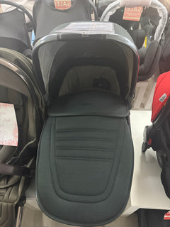 Babystyle Oyster 3 carrycot in dark olive green with padded liner and front hood