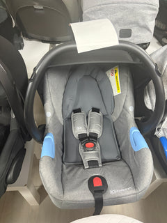 Grey newborn car seat with padded insert, 5-point harness, head support