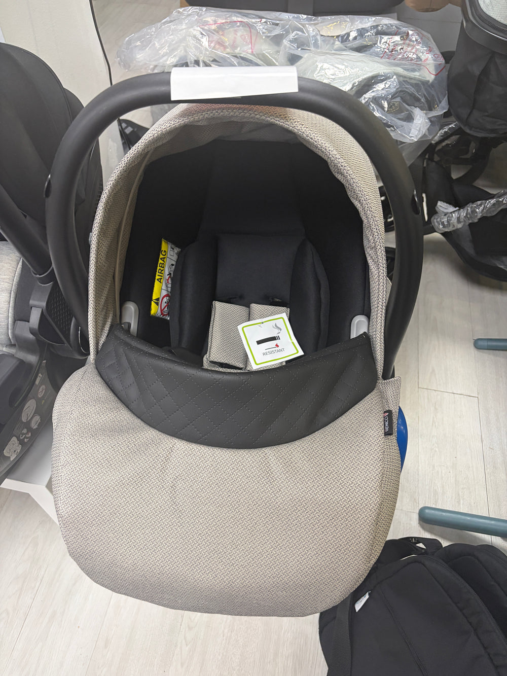 Venicci Newborn Car Seat - Beige Clearance