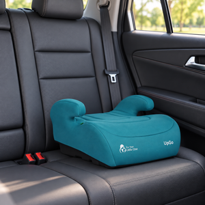 Teal UpGo belted booster seat installed on a car back seat