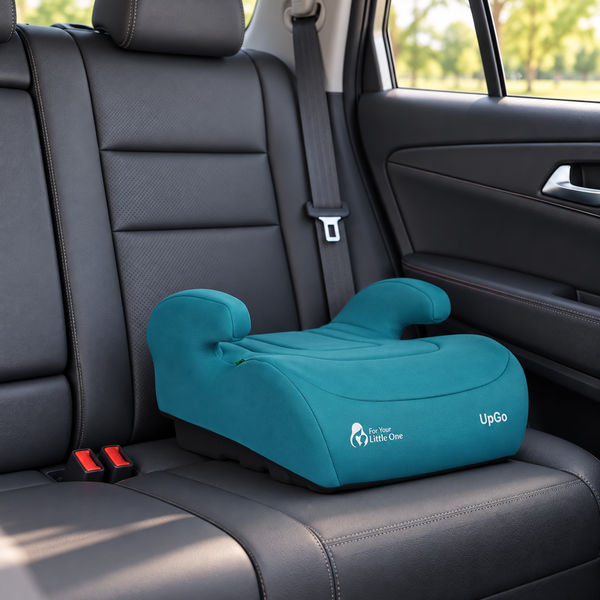 Teal UpGo belted booster seat installed on a car back seat