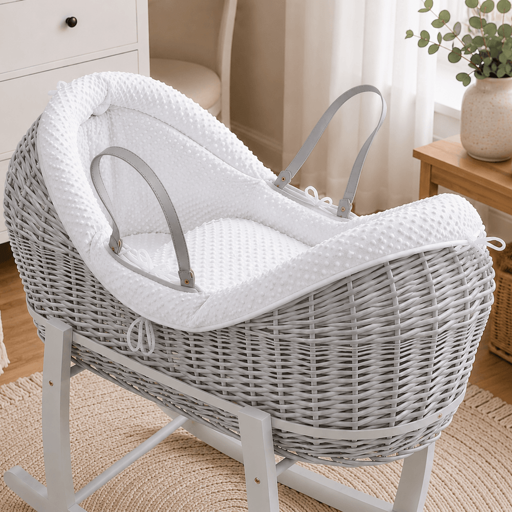 White dimple-textured moses basket bedding with side ties and fitted cover