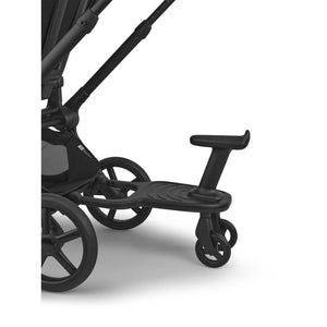Bugaboo wheeled board attached to a stroller, with the seat upright