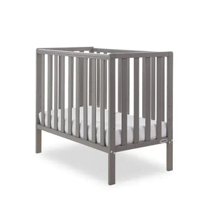 Taupe grey space-saver baby cot with full vertical slat frame and sturdy feet