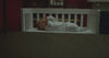 Jersey fitted crib sheet product video showing fabric stretch and fit